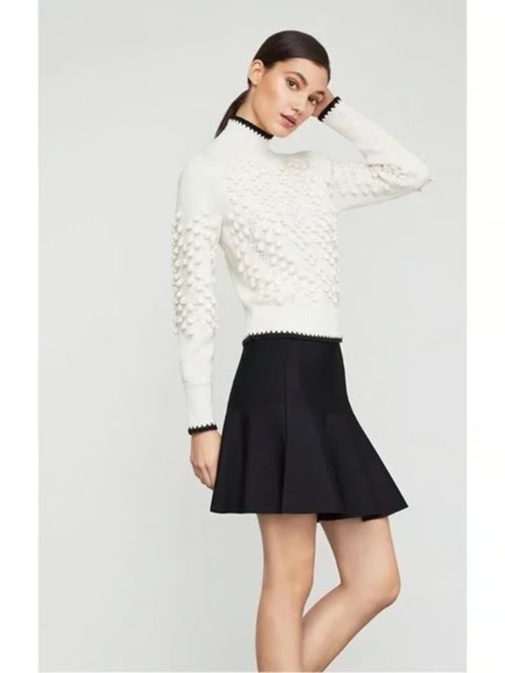 BCBGMaxAzria Cream Pom-Pom Knit Sweater with Black Trim - Picture 6 of 6